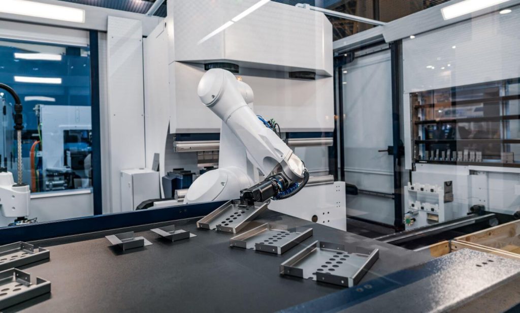 Use of robotic arms to control the cost of manufacturing